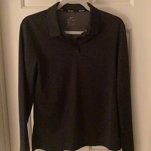 Nike golf shirt.